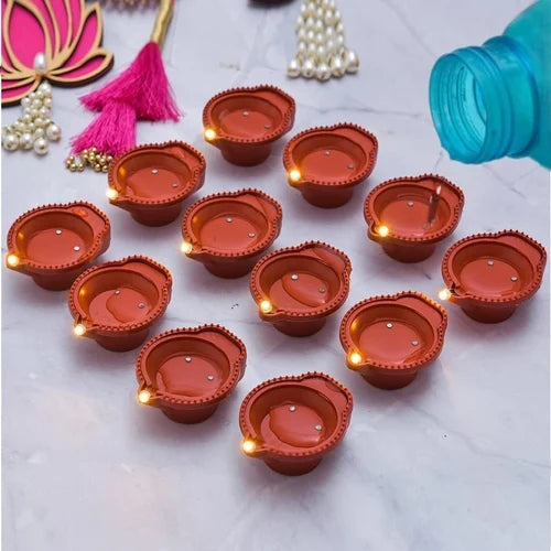 🌟 LED Water Sensor Diyas – Traditional Vibes with Modern Magic! 🌟(Pack of 6/12/18/24)